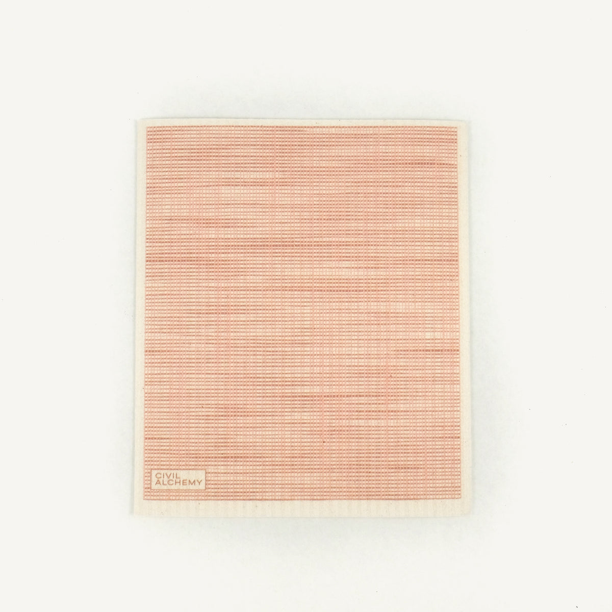 Pink woven Swedish dishcloth on a white background