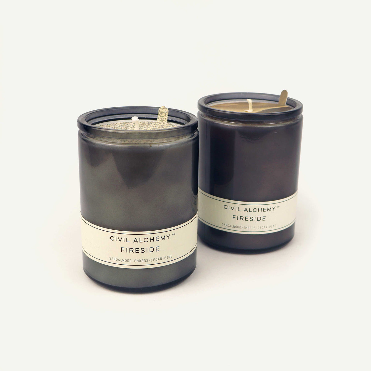 Gray candles labeled 'Civil Alchemy Fireside' on a white background