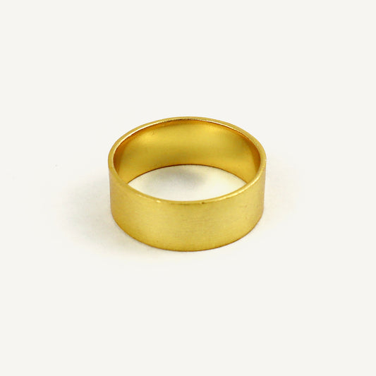 Gold ring on a white background