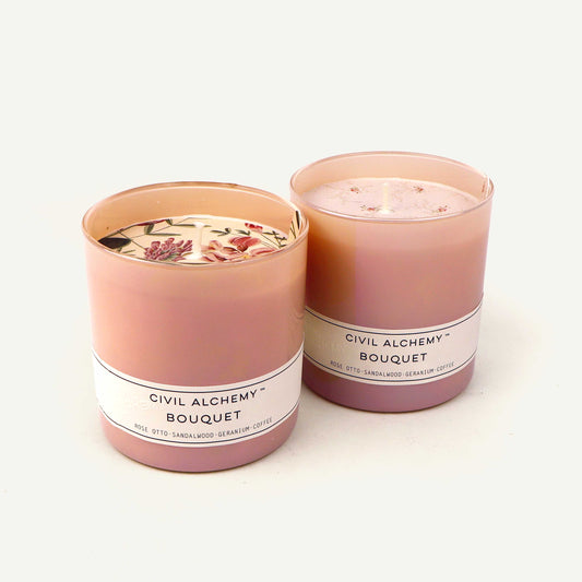 Two candles from Civil Alchemy on a white background