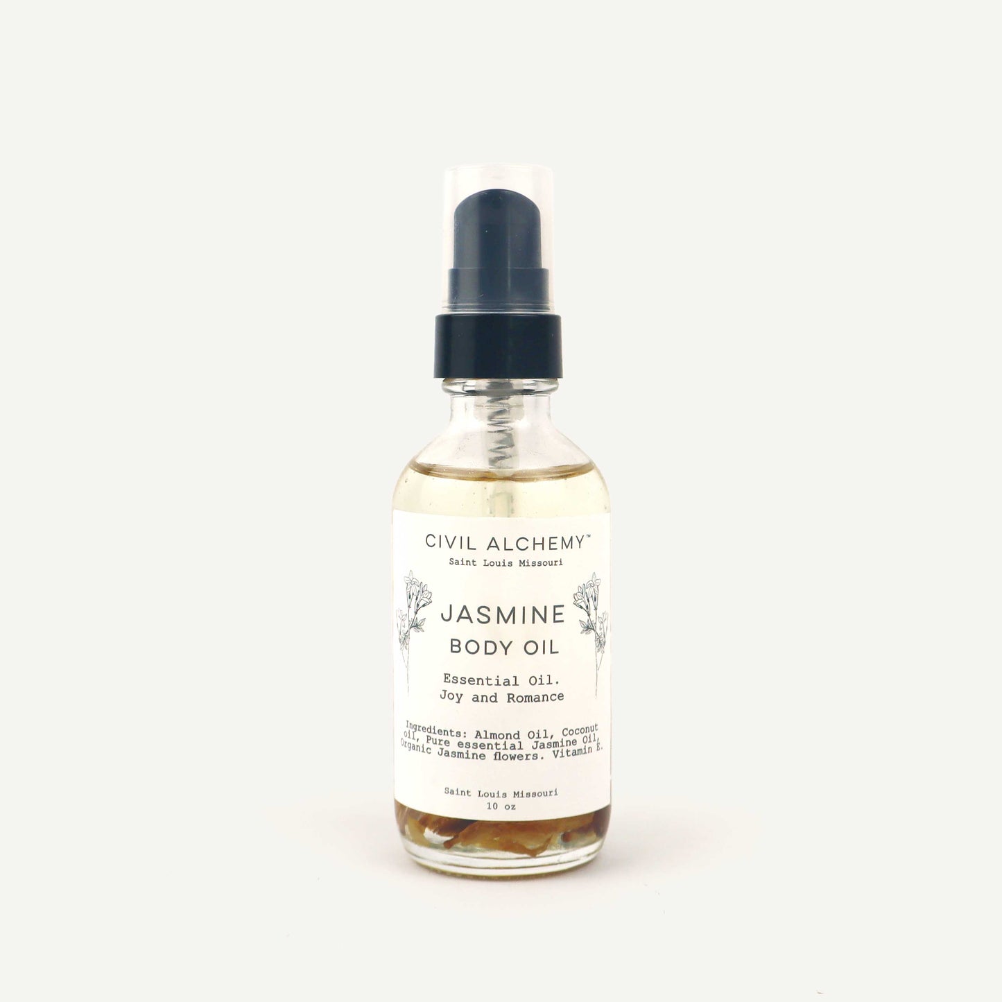 Bottle of Jasmine body oil with a label on a white background