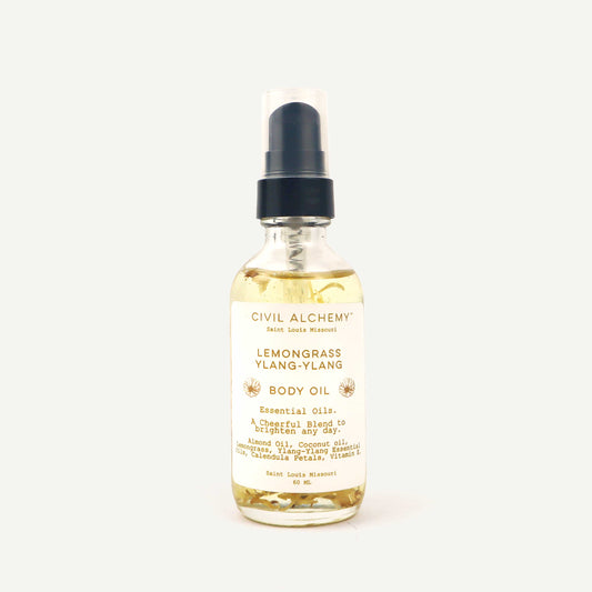 Bottle of Civil Alchemy Lemongrass Ylang-Ylang body oil on a white background
