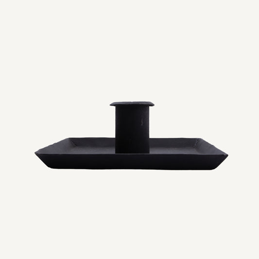 A black square iron candle holder designed for home decor.