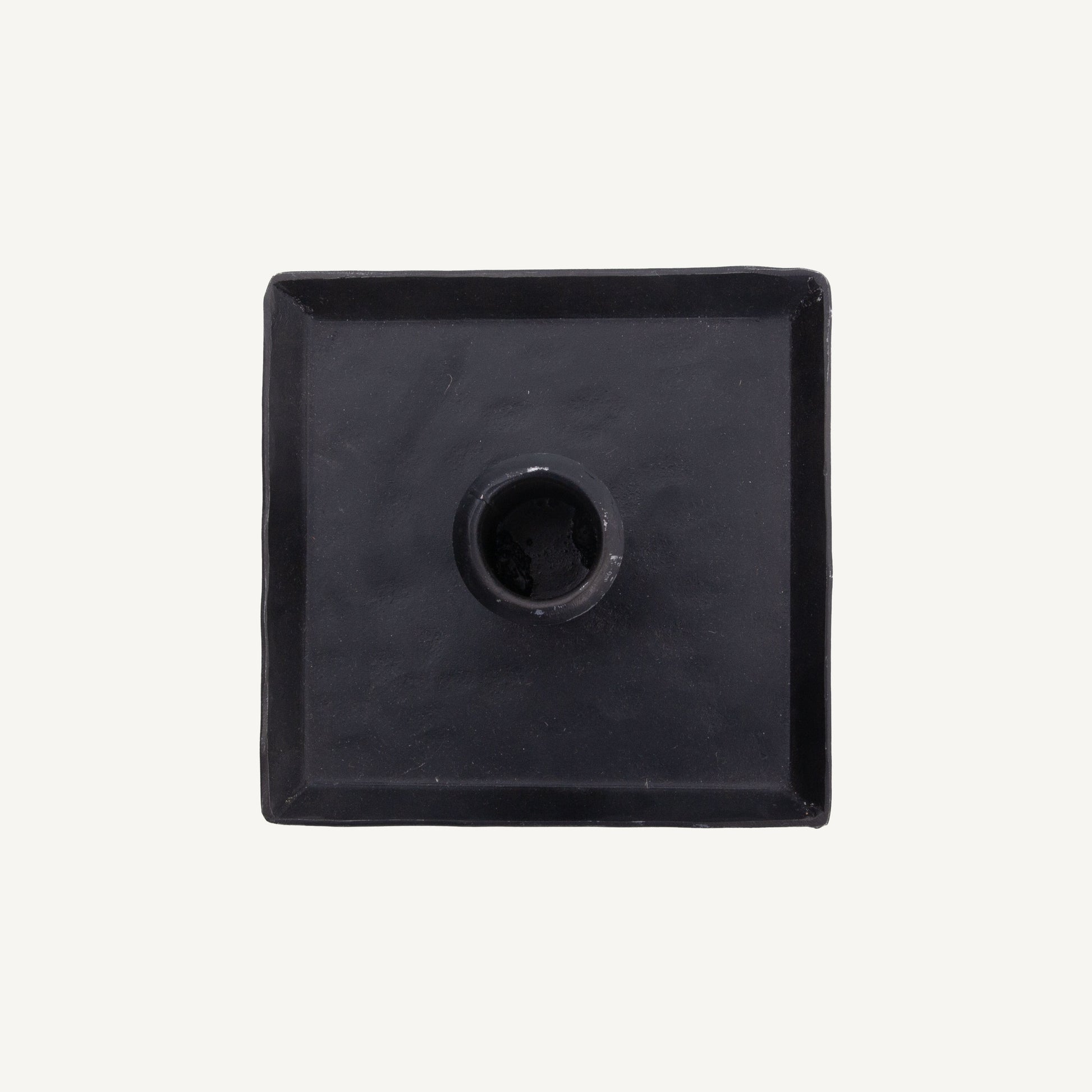 Square Iron Candle holder top view on white background.