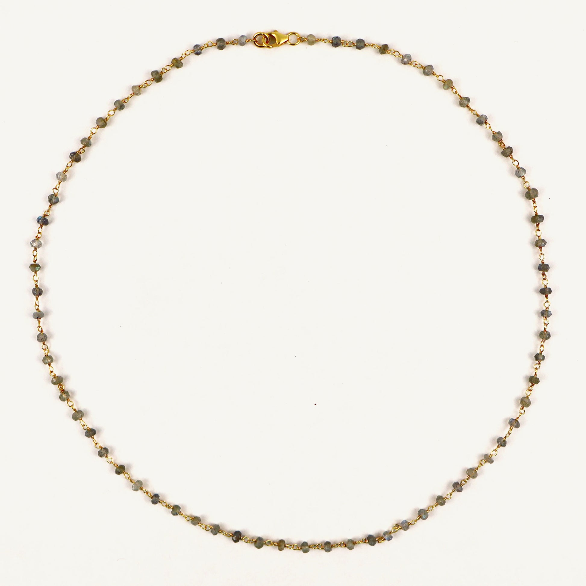 Necklace with small beads on a white background