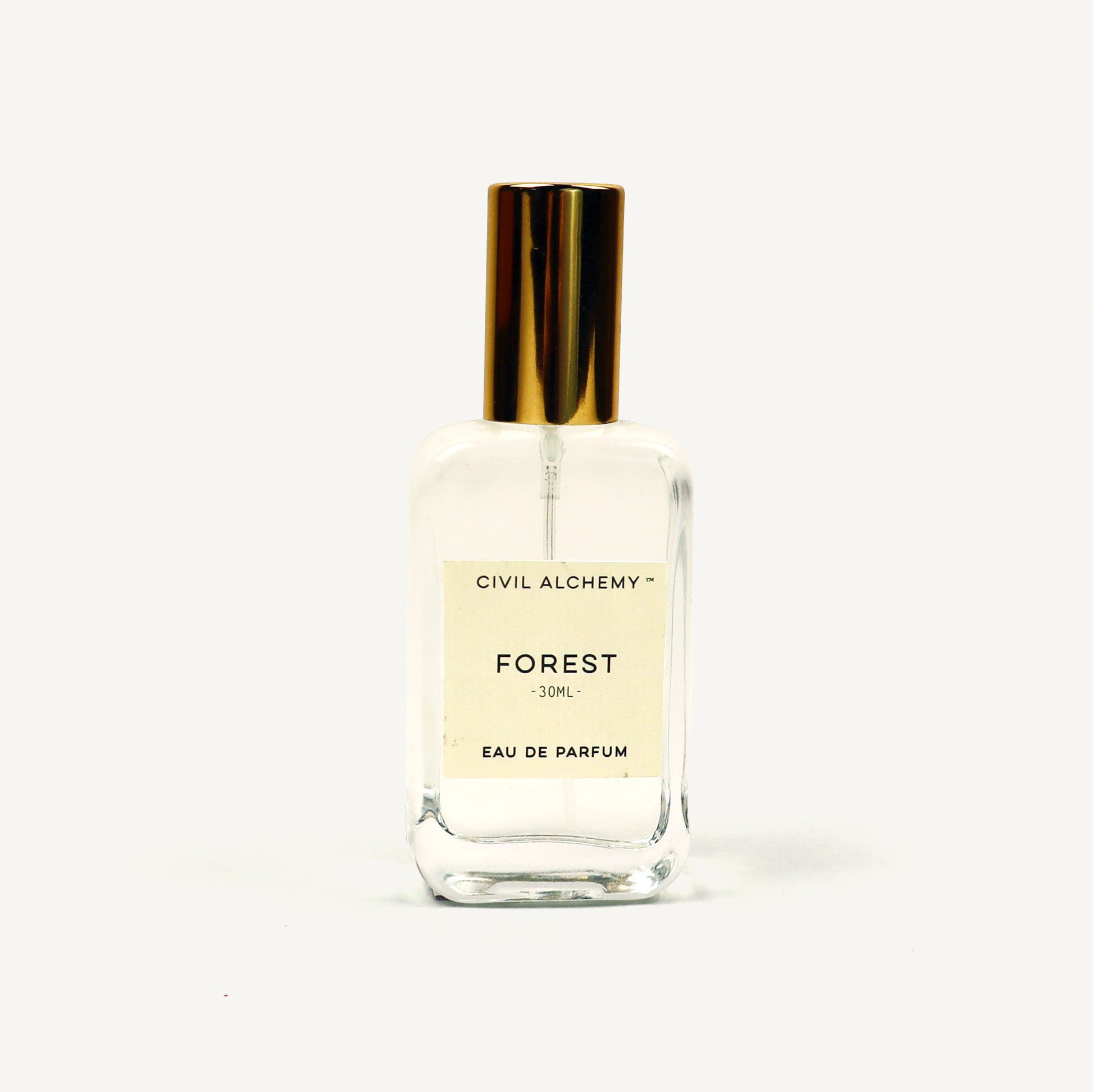 Perfume bottle labeled 'Forest' by Civil Alchemy on a white background
