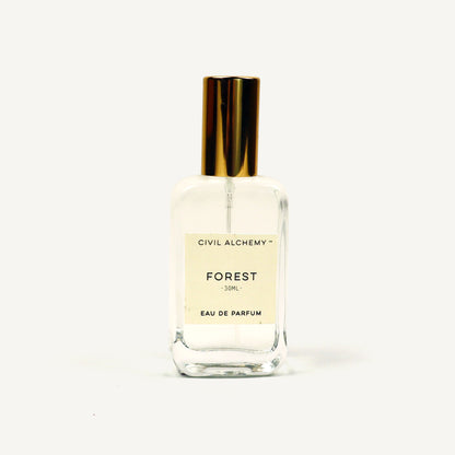 Perfume bottle labeled 'Forest' by Civil Alchemy on a white background