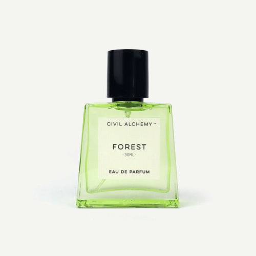 Green perfume bottle labeled 'Forest' by Civil Alchemy on a white background