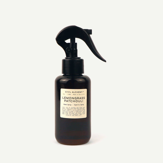 Brown spray bottle labeled 'Lemongrass Patchouli' on a white background