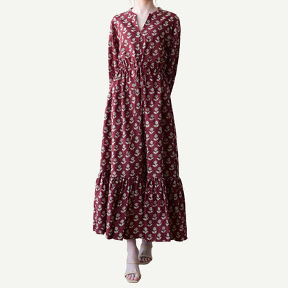 Maroon floral dress on a white background