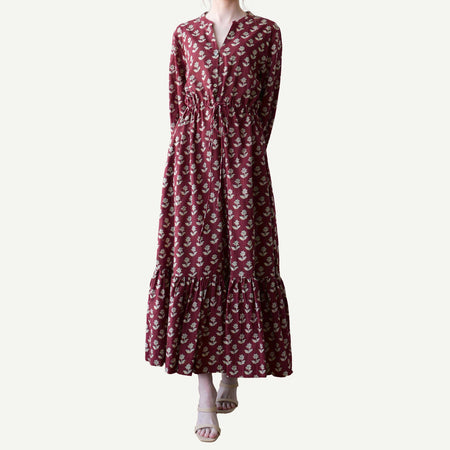 Maroon floral dress on a white background