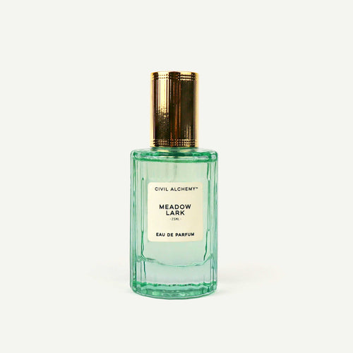Perfume bottle labeled 'Meadow Lark' by Civil Alchemy on a white background