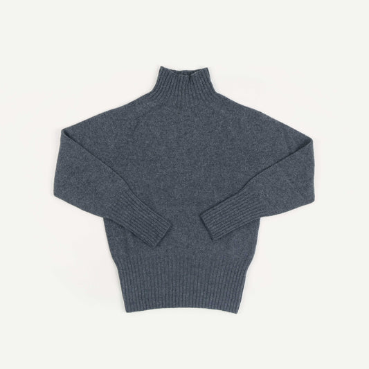 Gray turtleneck sweater on a white background