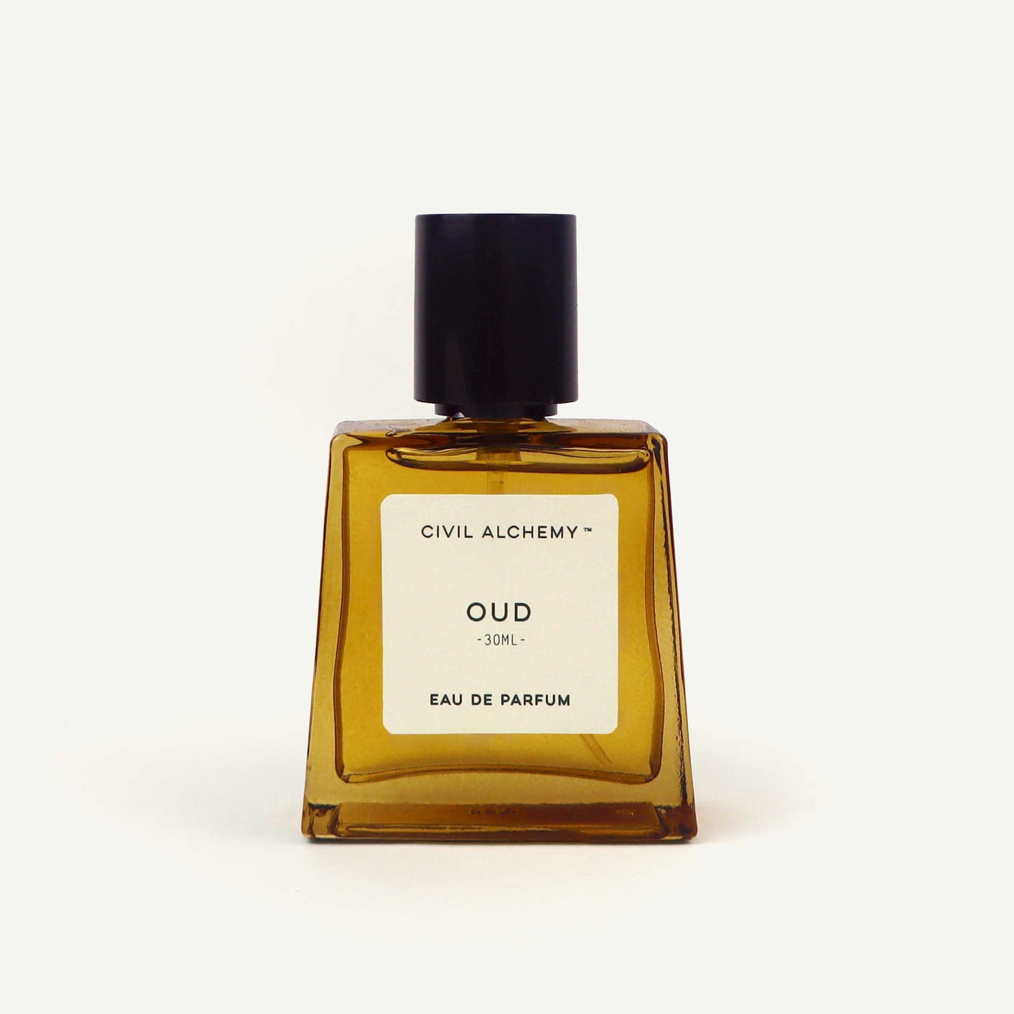 Brown perfume bottle labeled 'Oud' by Civil Alchemy on a white background