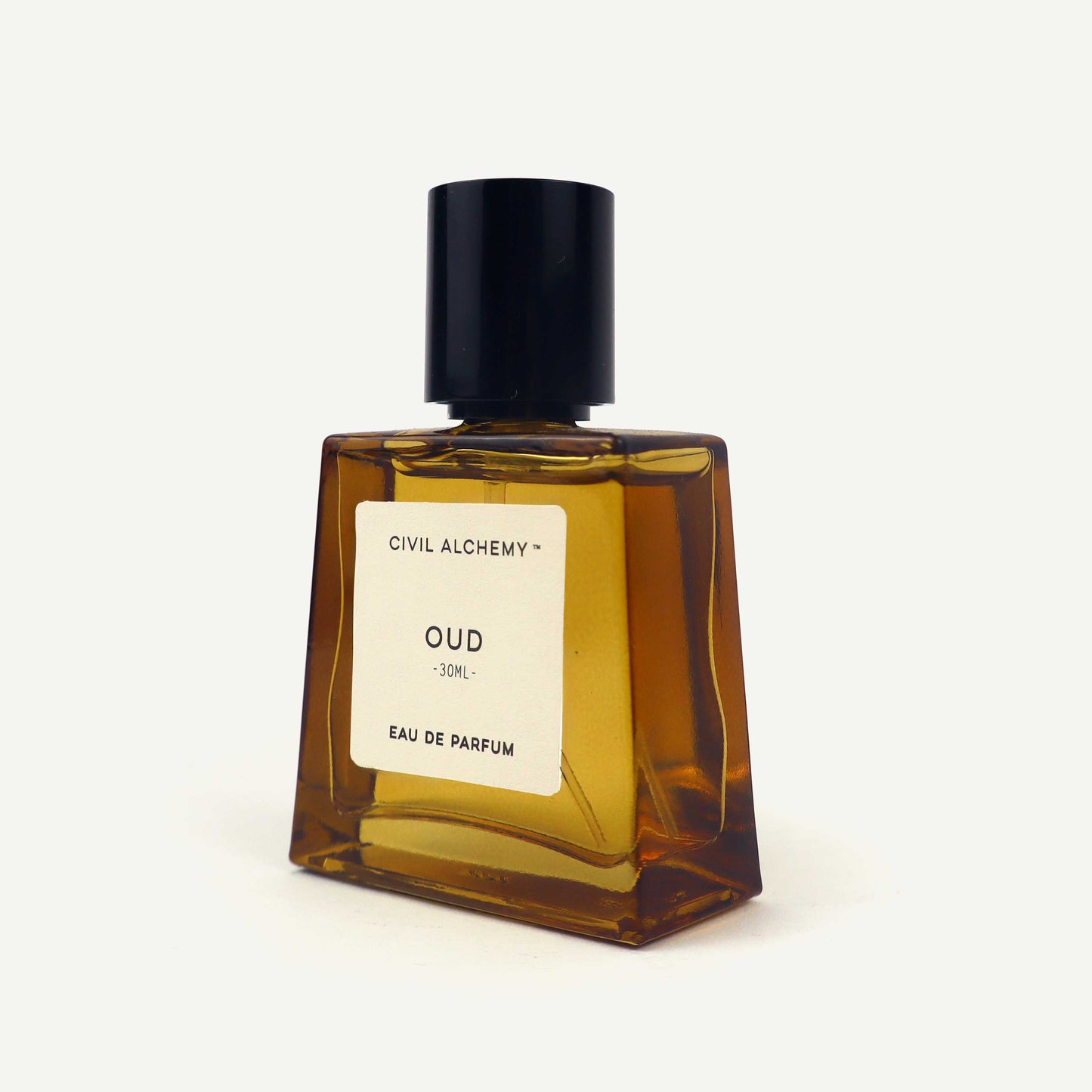 Perfume bottle labeled 'Oud' by Civil Alchemy on a white background