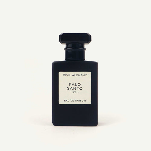 Black perfume bottle labeled 'Palo Santo' by Civil Alchemy on a white background