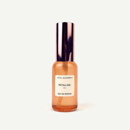 Perfume bottle labeled 'Petaline' by Civil Alchemy on a white background
