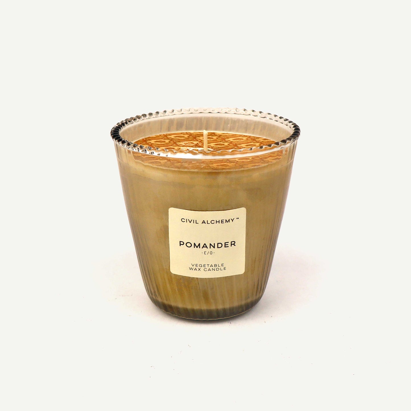 Candle with a Civil ALCHEMY POMANDER label on a white background