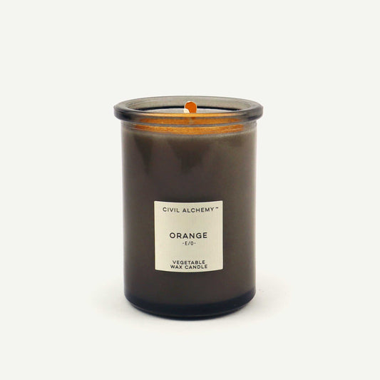 Candle with a label on a white background