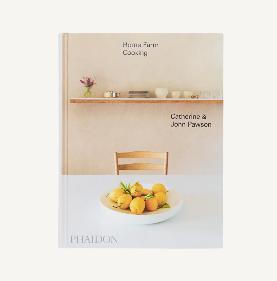Book cover of 'Home Farm Cooking' by Catherine & John Pawson with a bowl of fruit on a table.