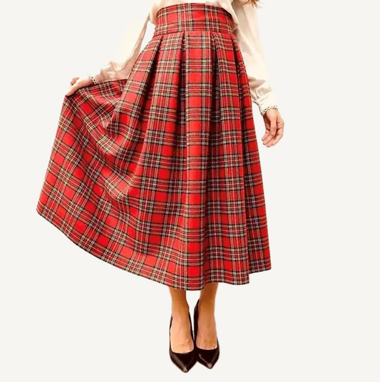 Red plaid skirt worn by a person on a white background
