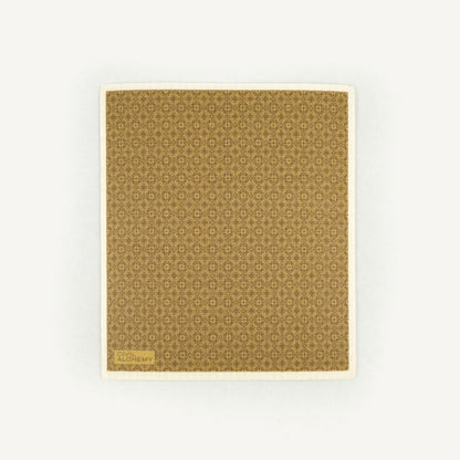 Patterned brown Swedish dishcloth on a white background