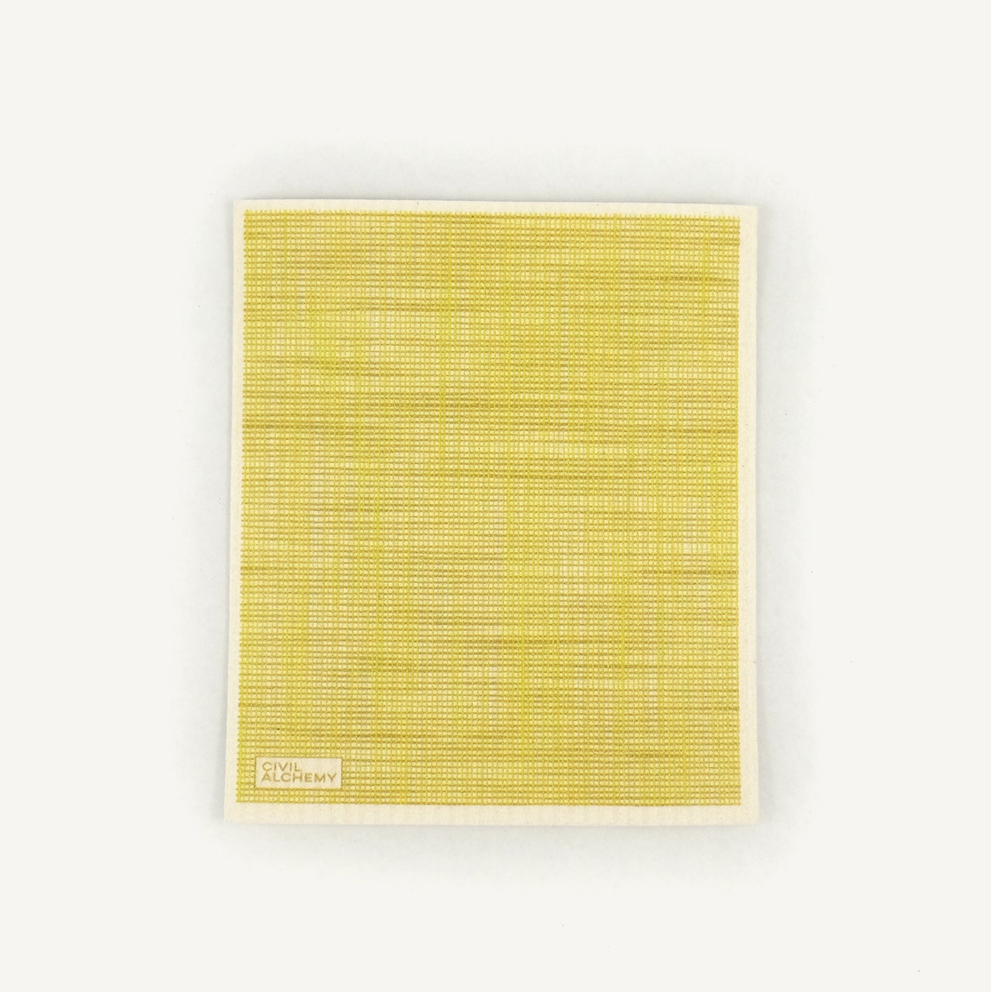 Yellow textured Swedish dishcloth with 'Civil Alchemy' logo on a white background