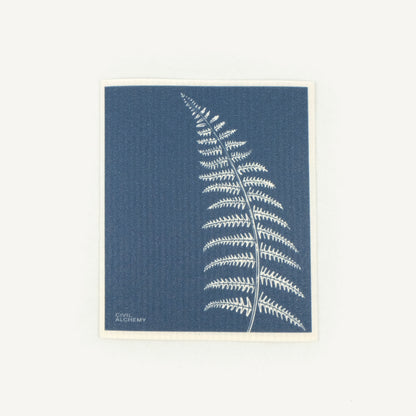 Fern design on a blue background with 'Alchemy' branding.