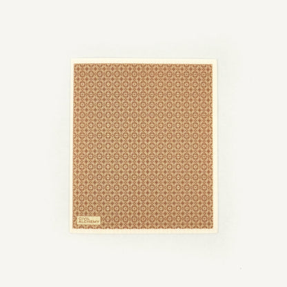 Patterned Swedish dishcloth with geometric design on a white background
