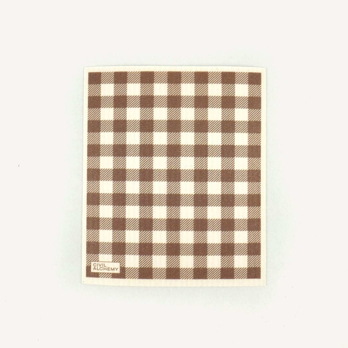 Brown gingham patterned Swedish dishcloth on a white background