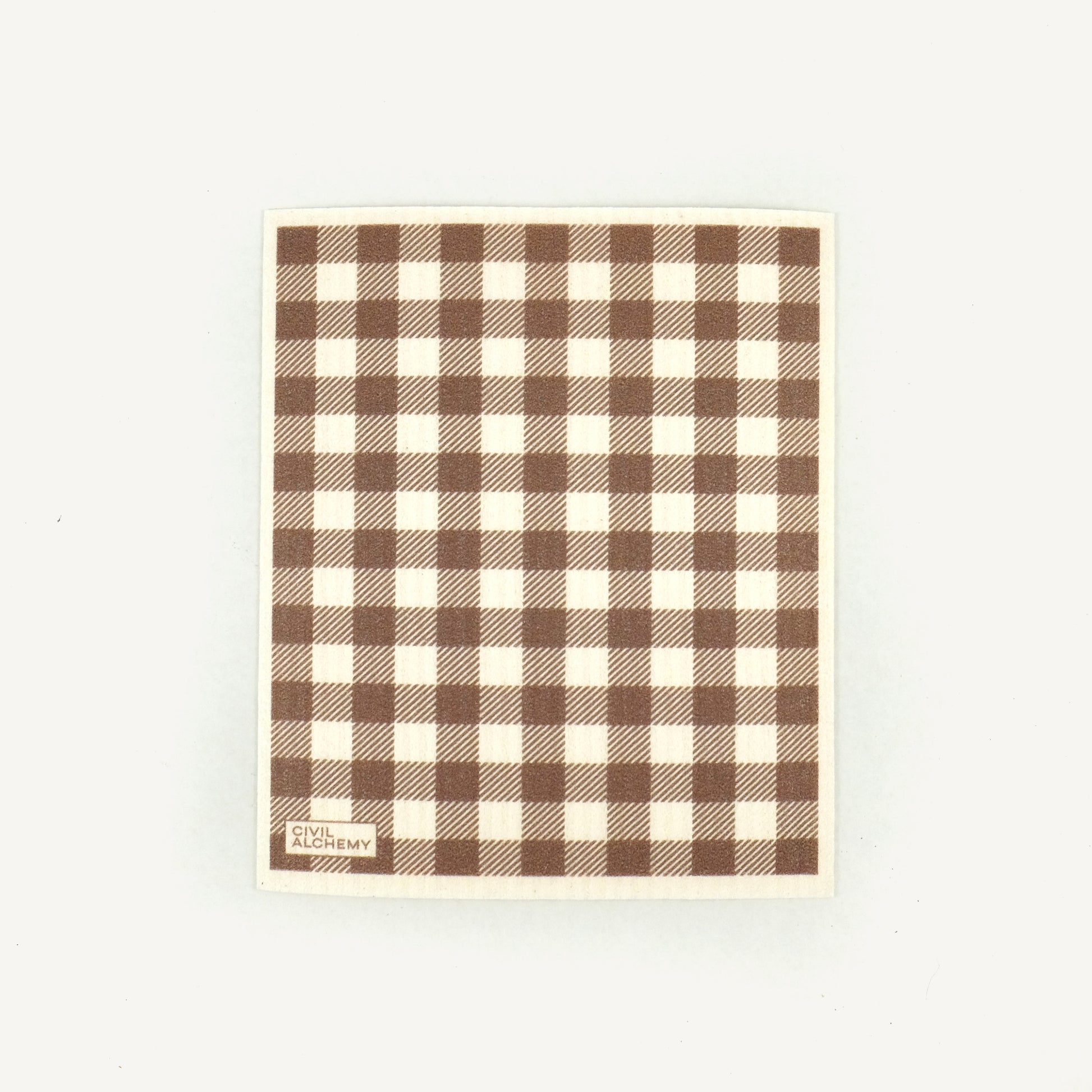 Brown gingham patterned Swedish dishcloth on a white background