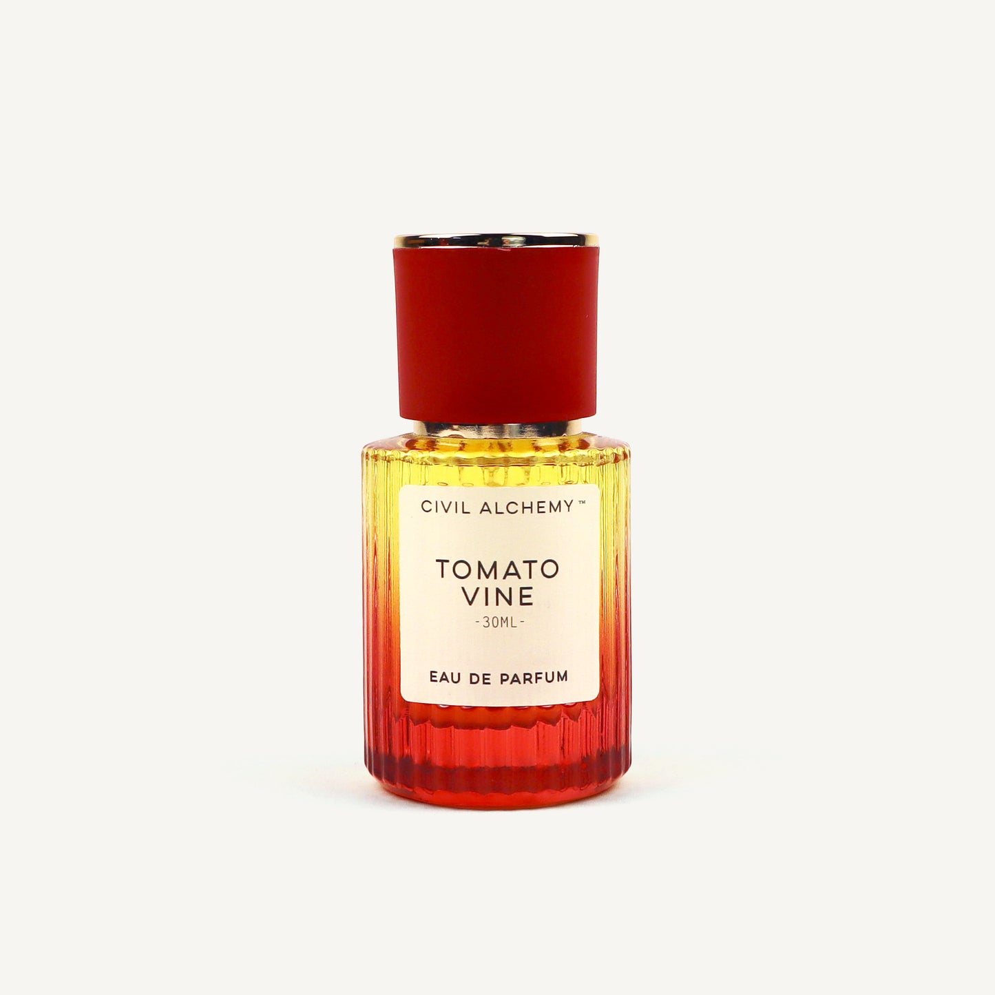 Perfume bottle labeled 'Tomato Vine' by Civil Alchemy on a white background