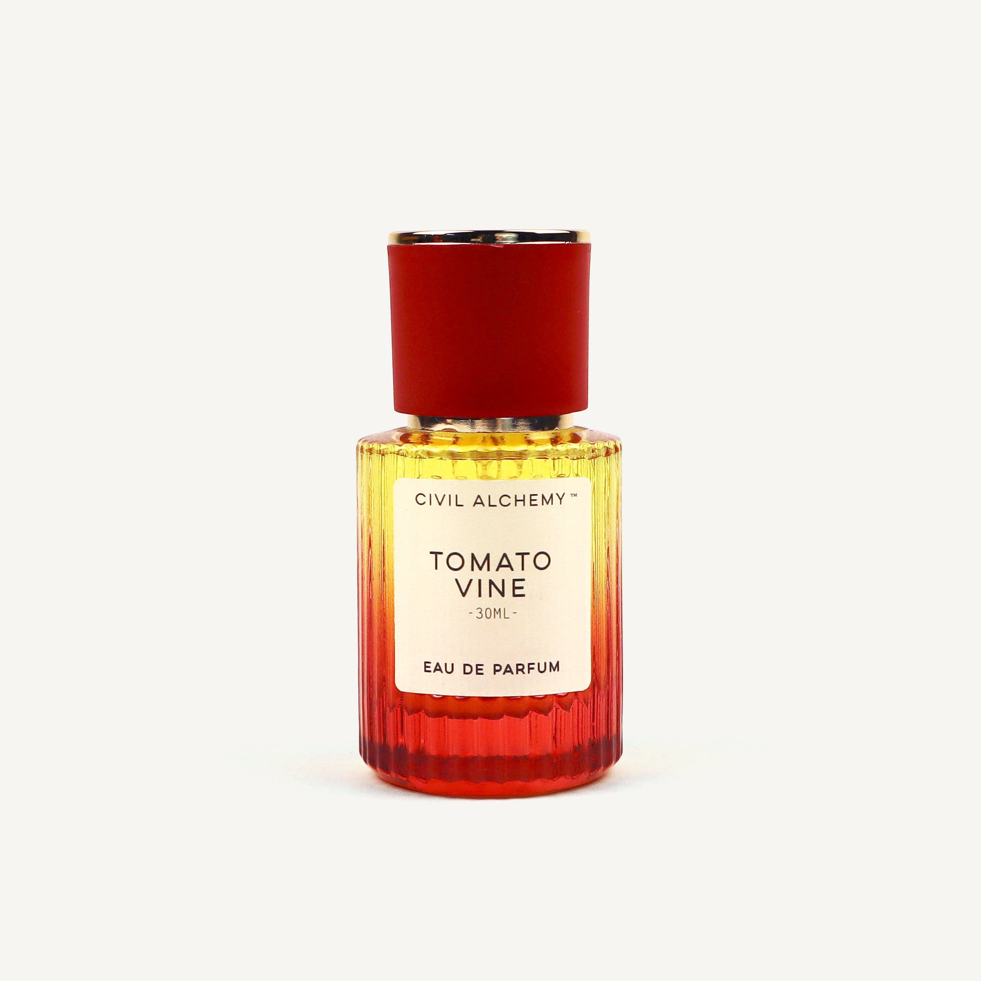 Perfume bottle labeled 'Tomato Vine' by Civil Alchemy on a white background
