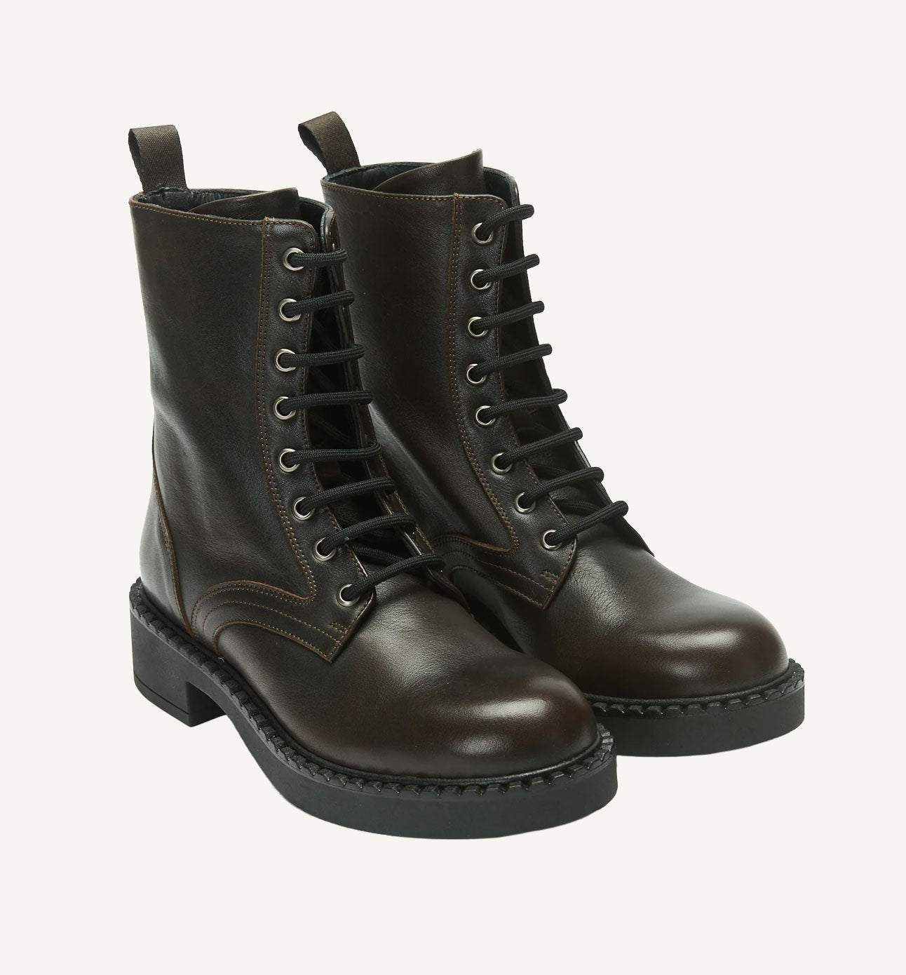 Pair of brown leather boots on a white background