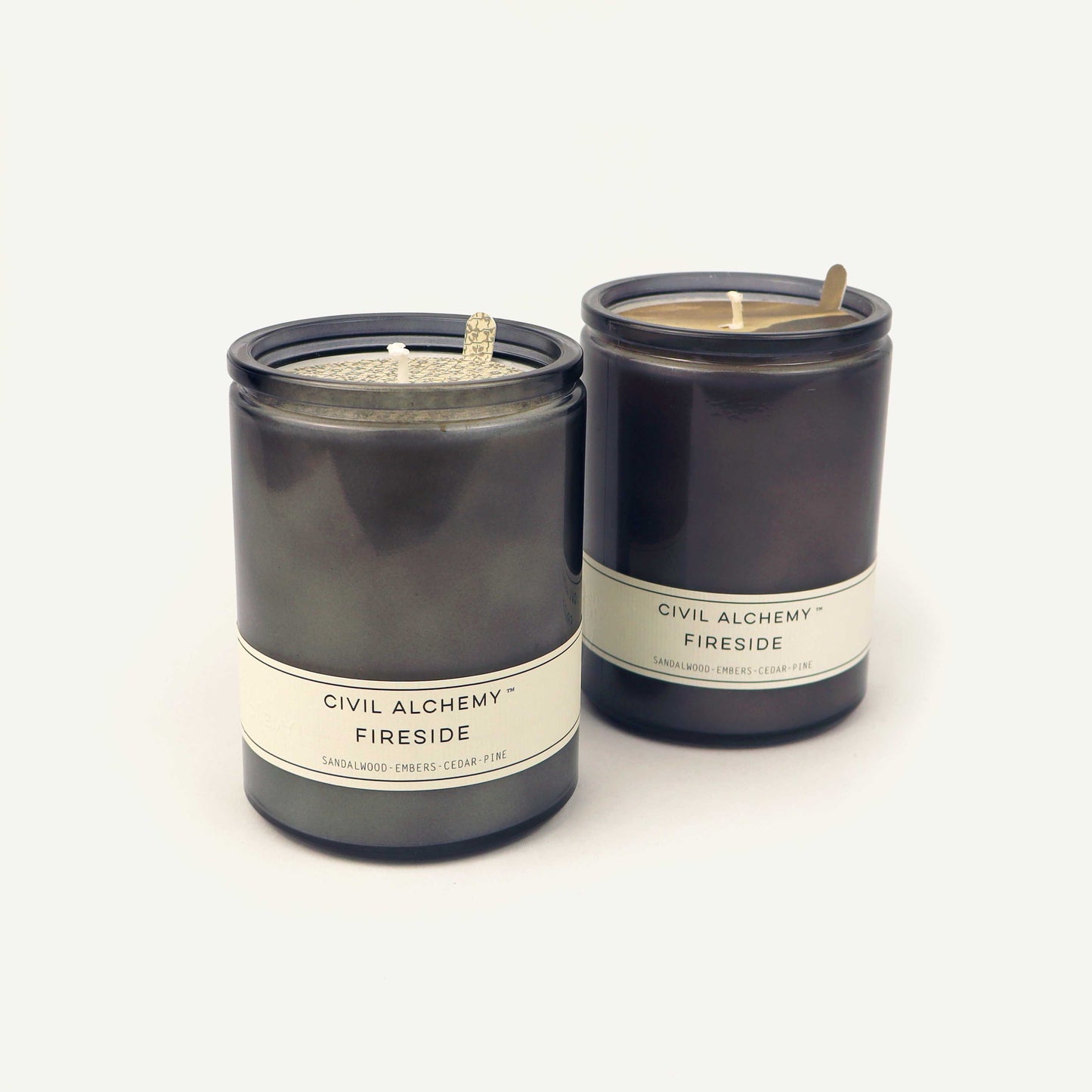 Gray candles labeled 'Civil Alchemy Fireside' on a white background