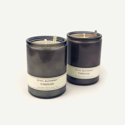 Gray candles labeled 'Civil Alchemy Fireside' on a white background