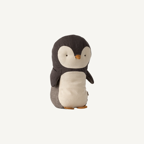 Stuffed penguin toy on a white background