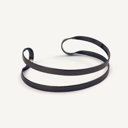 Black rubber band on a white background