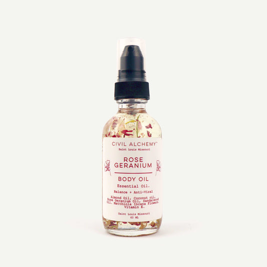 Bottle of Rose Geranium body oil from Civil Alchemy on a white background