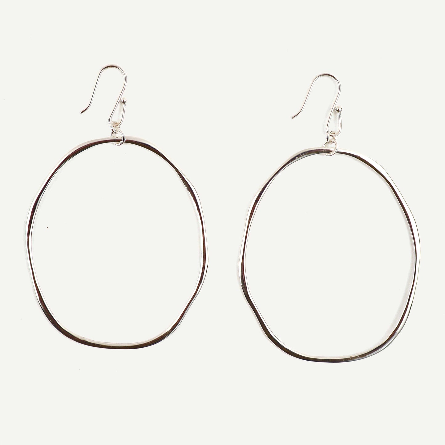 Pair of hoop earrings on a white background