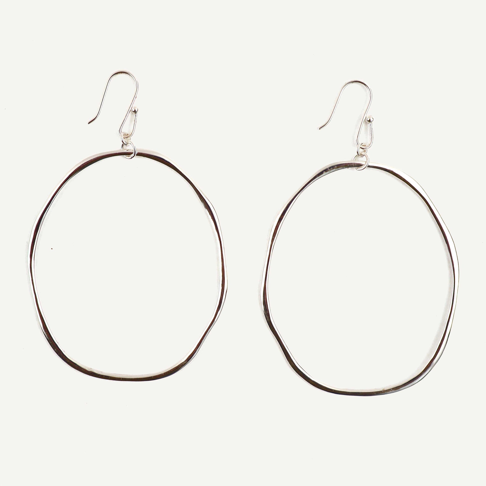 Pair of hoop earrings on a white background
