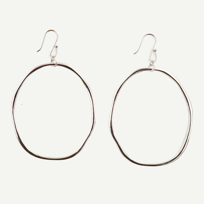 Pair of hoop earrings on a white background