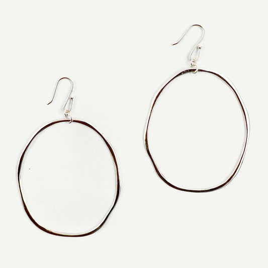 Pair of hoop earrings on a white background