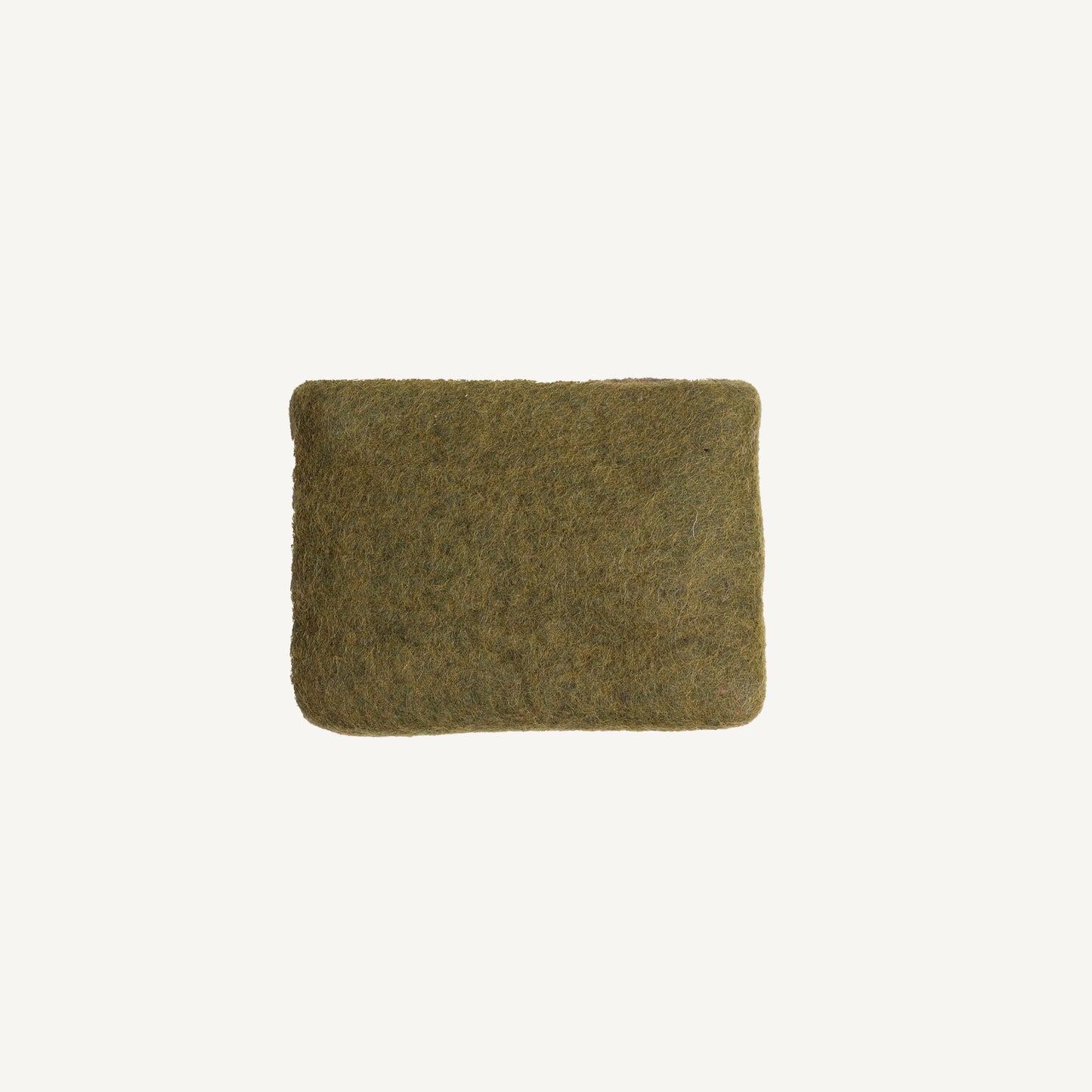 A solid olive wool coin pouch with a brass zipper, hand-felted by artisans in Nepal.