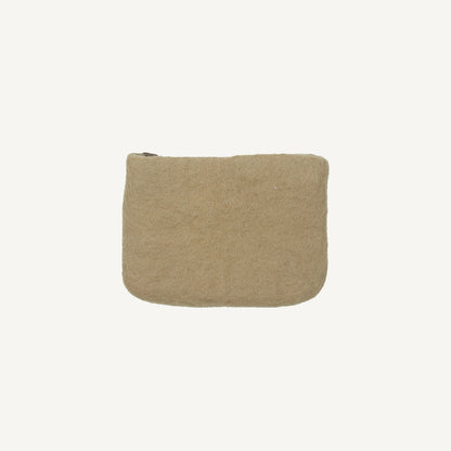 A solid taupe wool coin pouch with a brass zipper, hand-felted by artisans in Nepal.