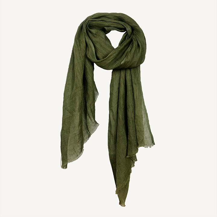 An olive green scarf with eyelash fringe, displayed on a plain background.